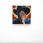 painting of a cowboy covering his face with his hand