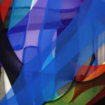 abstract fabric piece with blue, purple, green red and black