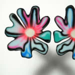 painting in a frame of 2 flowers as eyes for a faceapainting in a frame of 2 flowers as eyes for a facea