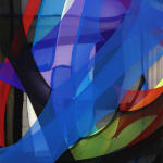 abstract fabric piece with blue, purple, green red and black