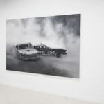 black and white painting of two cars crashing with smoke around them
