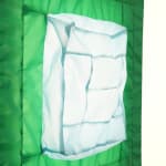 green fabric light hung on wall