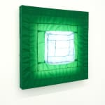 green fabric light hung on wall