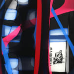 abstract black and red fabric stretched on bars withe a photo of a dog