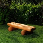 wooden bench on grass