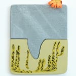 abstract sculpture with orange flower