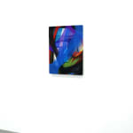 abstract fabric piece with blue, purple, green red and black