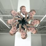 abstract sculpture including multiple portraits of Uma Therman