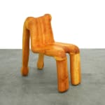 wooden chair shaped like a human