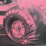 painting of a flat tire on a race car. painted in pink