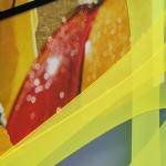 abstract fabric collage with a snippet of a photo of a person wearing a rain jacket