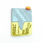 abstract sculpture with orange flower