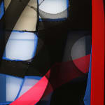 abstract black and red fabric stretched on bars withe a photo of a dog