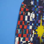 paper collage of a young child on a blue background