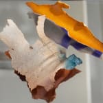 photo of a ceramic artwork made to look like pieces of bark from a eucalyptus tree
