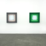 green fabric light hung on wall