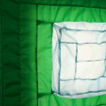 green fabric light hung on wall