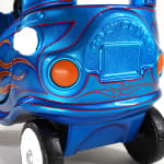 photo of a blue childrens car with painted flames