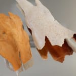 photo of a ceramic artwork made to look like pieces of bark from a eucalyptus tree