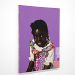 paper collage of a young child on a purple background