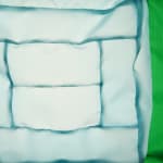 green fabric light hung on wall