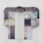 A mixed media piece depicting a multicoloured pattern stretched over metal.