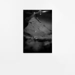 A black and white inkjet print of an abstract, unidentifiable scene.