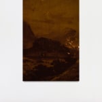 An inkjet print of a shadowy mountainous landscape.