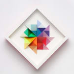 wooden geometric wall sculpture by Sean newport - rainbow