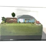 sculpture in glass case