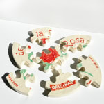 Ceramic sculpture of a de la Rosa mazapan cut into a puzzle