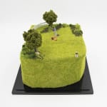 miniature of a person burying a body