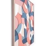 Side view of a framed multicolor wood relief sculptural piece made up of spiral shapes and curves by artist Scott Albrecht