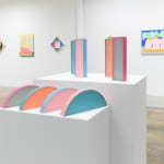 Install image of "Cosmic Bloom" - Rachel Strum's HALO and MONOLITH sculptures.