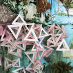 Detail image of hollow pyramids made by paper in Gregory Euclide's "Spangle."