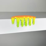 blob sculpture in yellow and green