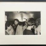 Black and white photo of men inside a bathroom
