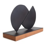 Scott Albrecht - iron sculpture, abstract half circles splitting