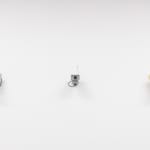 Three sculptures of CCTV cameras by Jeff Canham.