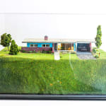 full view of artwork with glass case