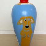 Jillian Evelyn - Sculpture of repurpose vase painted with dogs, blue background, red top