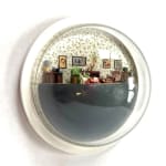 sculpture in glass case