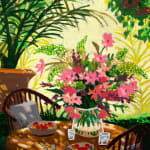 pink and green flowers on a table surrounded by sunlight and nature