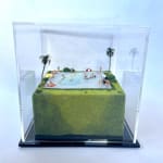 sculpture in glass case