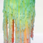 Dan Lam slime sculpture with gradient of green, red, and blue