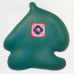 green figure by Jocelyn Tsaih with a square canvas in the middle with a purple, red, and pink painting of a flower like figure