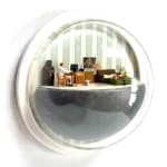 sculpture in glass case