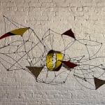 Wire hanging mobile sculpture with colorful panels in red, blue, yellow