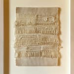 Beige woven rectangle in a frame