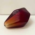 A pomegranate seed made out of Murano glass